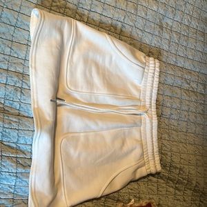 Sweat pants material skirt white color with 2 pockets from American threads